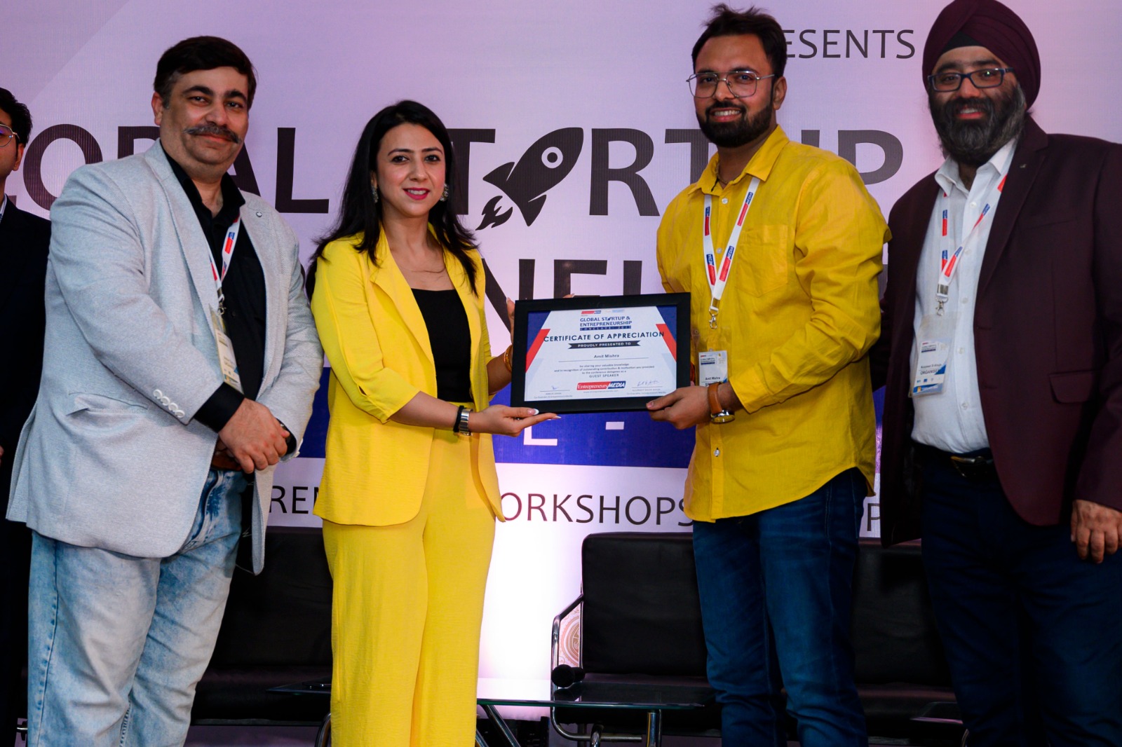 Amit Mishra receiving an award